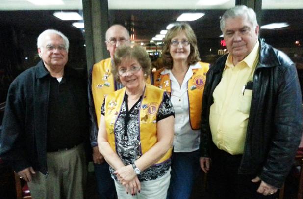 Lions Club raises money for sight services Shown center, front is Beverly Bodiford, rear (l to r) Carl Gibson, Vernon Henderson, Norma Childers and Doug Henderson.