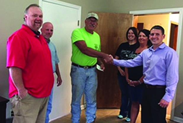 City of Middleton receives donation The City of Middleton received a $1,000 donation from the Norfolk Southern Railroad. Pictured left to right are: Steve Perkins, Norfolk Southern Railroad, James Simpson, Jr., City of Middleton’s Vice Mayor, Tommy Seever, City of Middleton Fire Chief, Brandy Dixon, firefighter, Barbara Seever, firefighter, and Eric Peters, Norfolk Southern Railroad.