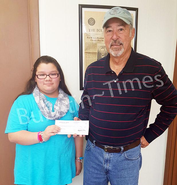 Bulletin-Times donates check to Hardeman Adoptable Animals Pictured (l-r): Samantha Sanchez amd Mike Madden.
