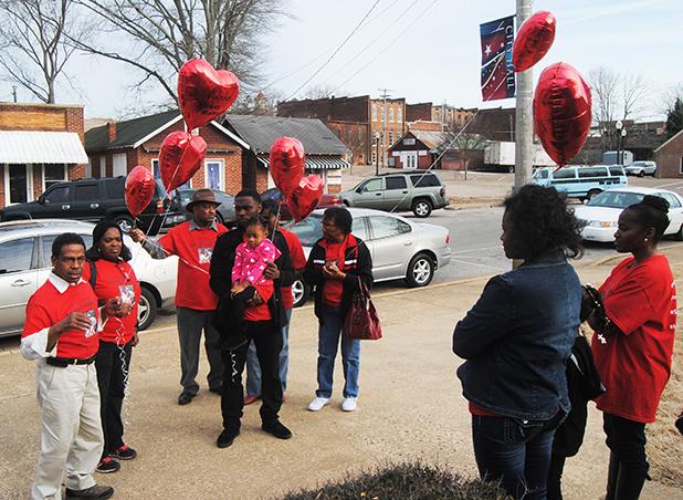 Stop the Violence Rally held in memory of Clarence Minter Members of the Minter family release balloons during the Stop the Violence Rally.