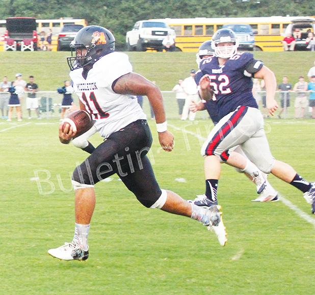 Middleton Falls in Opening Game Montrez Jones returning an interception for a touchdown in the first half. by Cristie Maness.