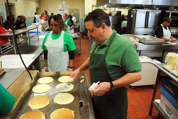 BES Pancake day a success Pictured is school board member Kenny Adkins working the griddle during Pancake Day.