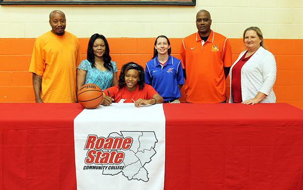 Parks signs with Roane State Rachelle Parks signed with Roane State to play basketball on the college level. Pictured are (l-r) Philip Parks (father), Stacey Parks (mother), Rachelle Parks (seated), Monica Bowles (Roane State head coach), James Burkley (MHS Lady Tigers head coach), Darlene Cardwell (MHS Principal).