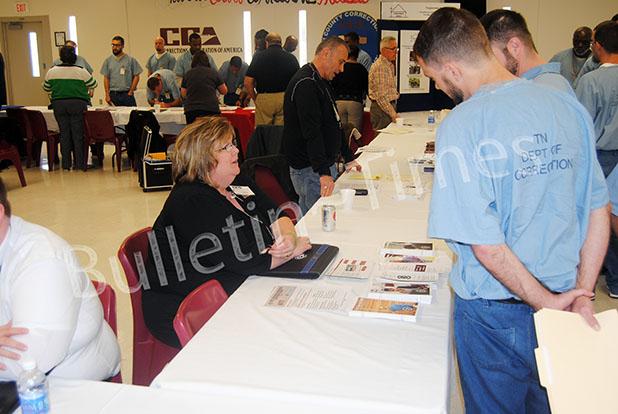 Prisoners at CCA Hardeman County Correctional Facility speak with representatives from various agencies during the first annual Re-entry Resource Fair on Thursday, Feb. 4.