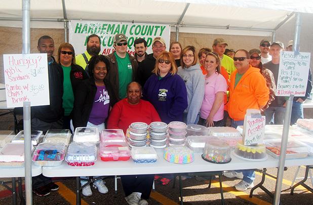Most of the members of the Hardeman County Rescue Squad showed up to help with this year's Boston Butt and bake sale. Members present (not in order) Kent Wadley, John Weaver, Dedi Wadley, Dujuana Naylor, James Tosh, Antoinette Henley, Jessica Howell, Tommy Naylor, Christopher Cox, Jerry Avent, Brian Keller, Rhonda Avent, Darren Grantham, Daniel Grantham, Dalton Wadley, Jordan Avent, Nathan Grantham, Steven McKeen, and Kristin Vandiver. Other helpers, (not members of rescue squad) Denita Jones, Christian Bea