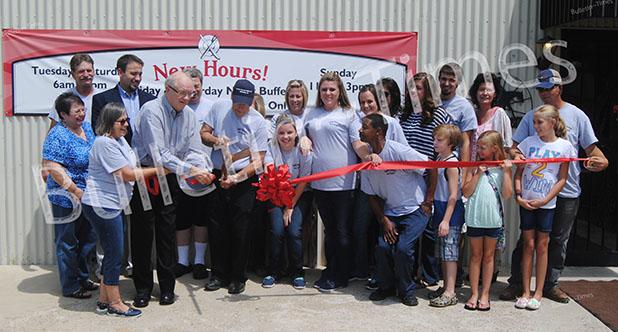 Family Restaurant and Buffet holds ribbon cutting New owner James Miles and manager Mary Zuniga cut the ribbon officially opening the Family Restaurant and Buffet while friends, family and civic leaders look on.