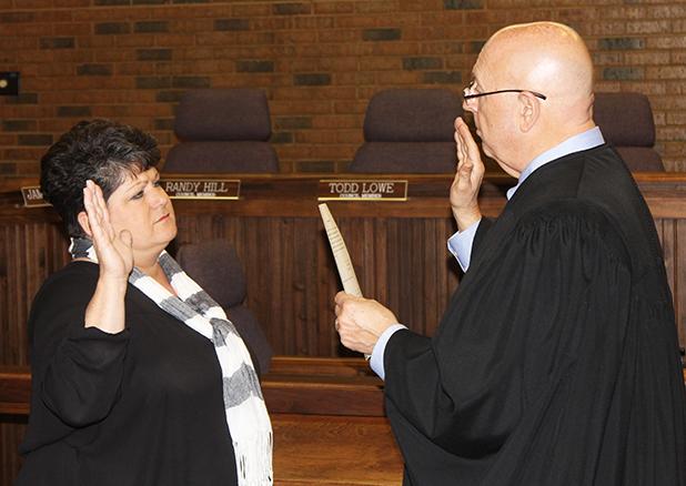 Rhea sworn into office Suzanne Rhea (left) was sworn in by city attorney Steve Hornsby on Friday, April 30, to complete her husband, David’s, term in office as a Bolivar city councilman