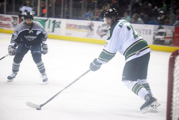 Mike Hayward handles the puck for the RiverKings.