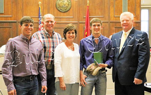 County Commission Honors Mitchell Ross with parents Jim and Vicky Mitchell, brother Clay and Hardeman County Mayor Jimmy Sain. Brother Clay is the #7 ranked rodeo cowboy in Canada. Photo by Ginger Tester.
