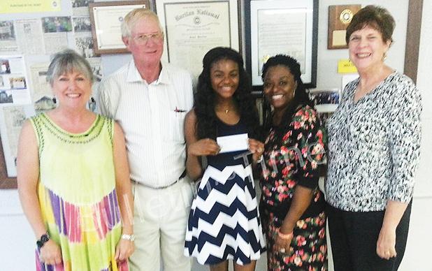 Ruritan Club Awards Scholarship to Mason Photo (left to right): Kandy Shackelford, Executive Director Hardeman County Chamber of Commerce, Earl Smith, Ruritan President, Dakedra Mason, scholarship recipient, Dekita Cheairs, and Mary Jo Gordon, Chairman of the Ruritan Scholarship Committee.