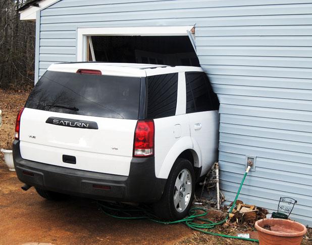 SUV crashes into house Article Image Alt Text