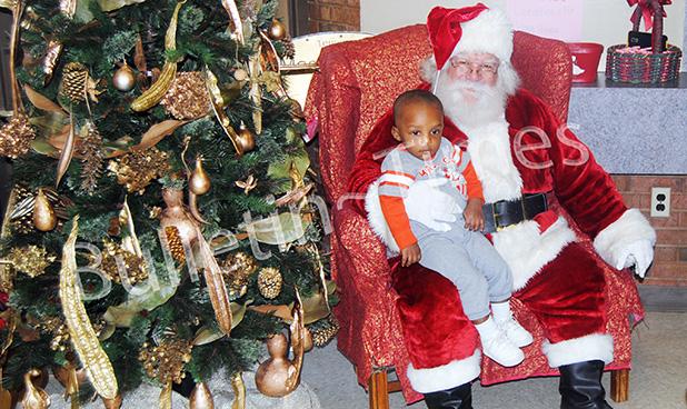 Hope Holiday Mart a huge success 15 month old Tanner Harris of Bolivar visits with Santa Claus during the seventh annual Hope Holiday Mart. Tanner’s parent’s are Ashley Harris and Taurus Griffin.