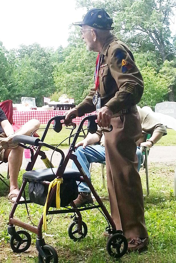 Eddie Spencer, WWII veteran, was the speaker at the Saulsbury Memorial Day program. He served under Gen. George Patton and was engaged in five major battles. At one point he was in combat for 550 straight days. 
