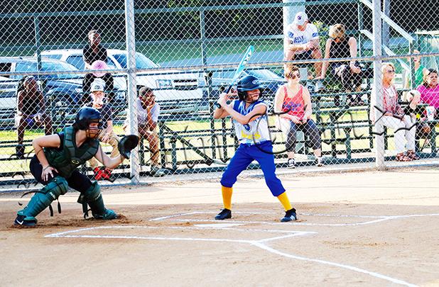Softball Tournament Ten Days Away Chloe Griffin of Whiteville hits as Madison Boatwright of Bolivar catches in the first inning of their game on September 19. Bolivar beat Whiteville 13-0.