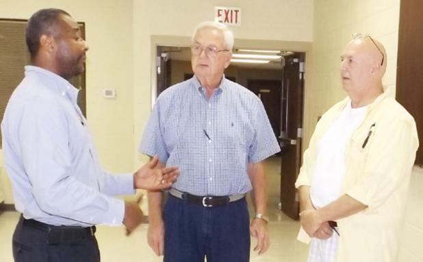 Local residents confront TDOT City of Bolivar Mayor, Barrett Stevens and Downtown Development CEO, Steve Hornsby inquire about bypass possibilities and plans with TDOT Community Transportation Planner, Carlos McCloud.