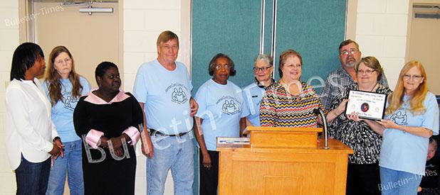 Lovelace honored at Taste of Hardeman County Hardeman County Literacy Council Members presented a plaque to the family of Margie Lovelace during this year’s Taste of Hardeman County, which was held in memory of Lovelace, who started the literacy council almost 30 years ago. Pictured (l-r) Shareta Hardaway, Betty Jordan, Antoinette Pirtle, Larry Lowrance, Hugholene Robertson, Louise Manhein, Cynthia Watkins, Allen Lovelace, Linda Lovelace, and Annette Lowrance.