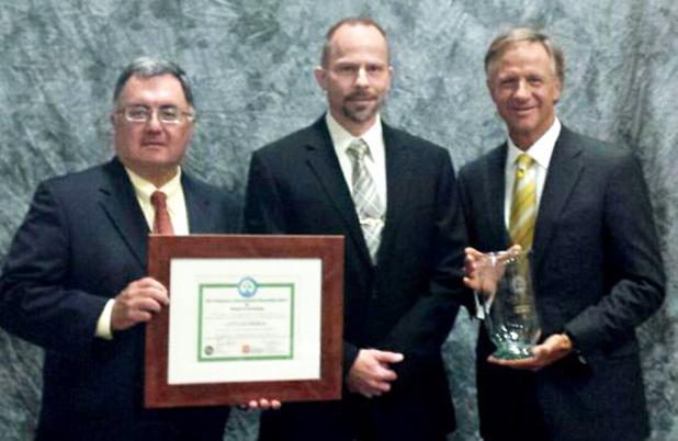 Courtesy of ThyssenKrupp Elevator  Patrick Ginn, Vice President, Manufacturing (Center) receives the 2015 Governor’s Environmental Stewardship Award from Tennessee Gov. Bill Haslam (right) and Tennessee Department of Environment and Conservation Commissioner, Bob Martineau (left) 