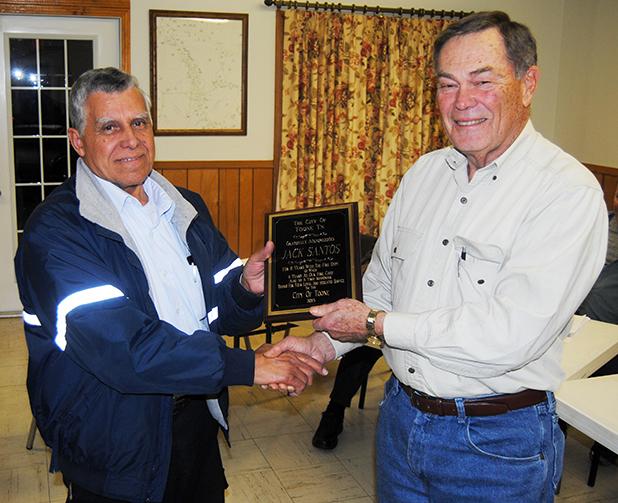 Toone fire chief honored Toone Mayor Joe Jones, (right) presents a plaque to Toone Fire Chief Jack Santos is appreciation for 11 years of dedicated service to the Toone Fire Department.