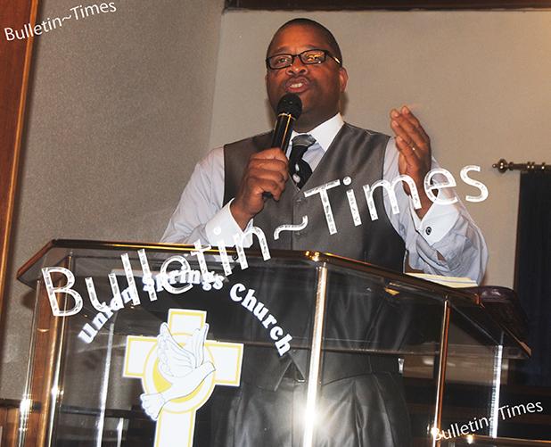 Fred Perry delivers a message during the Union Springs Missionary Baptist Church's annual men's conference. 