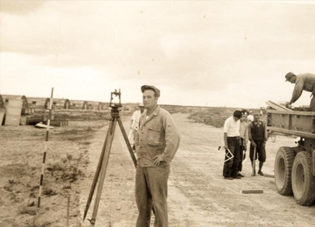Willis Hornsby, pictured on a scene surveying, served in the Korean War and assisted in “rebuilding Japan” by surveying areas damaged during war. 