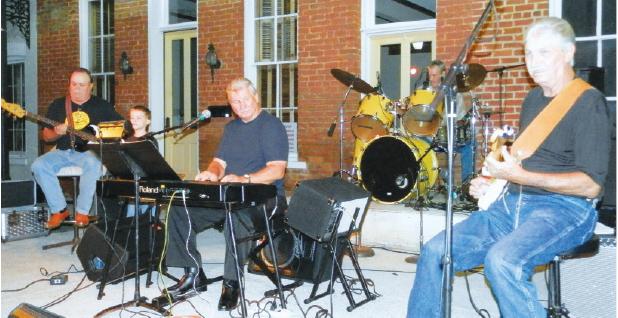 The Wolf River Band on stage.