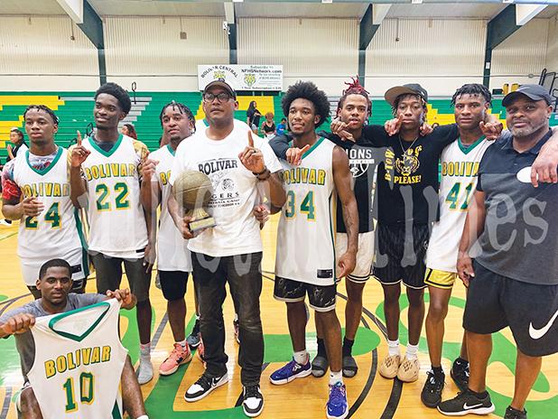Photo left to right: Jamarion Pirtle, Christian Clark, Tovarus Woods, Coach Devon Lake, Jeff Norment, Jaquan Lax, Trey Henderson, Toris Woods, Coach Dennis Bills. In front: D.J. Smith. Not pictured: Isaiah Perry and Brandon Neely.