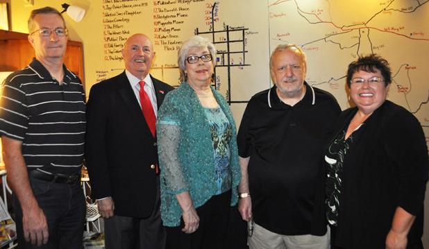 Bolivar Downtown Visitors Center debuts at On the Square Gallery Pictured (l-r): Hardeman County Executive Director Rob Jensik, CEO of the Bolivar Downtown Development Corporation (DevCo) Steve Hornsby, Monita Carlin, President of the Hardeman County Chapter APTA Ken Savage and On the Square Gallery & Gifts owner Deborah Brasfield standing in front of the maps that will guide visitors through Hardeman County.