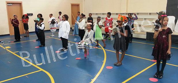 Third Grade students at Grand Junction Elementary School are shown here posed and in costume as they portray famous African Americans during their “wax museum” presentation on Friday, Feb. 26 in the school’s gymnasium. Athletes, actors, political figures, and civil rights activists were included in their exhibition. 