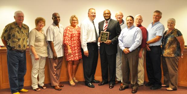 Board of Education recognizes Rickey Griggs Pictured are school board members (l-r) Jerry McCord, Beverly Bodiford, Jerry Crisp, Jennifer Aylor, Hardeman County Director of Schools Warner Ross, II, Rickey Griggs, Buddy Nelms, Kenny Adkins, Terry King, Bobby Henderson and Patricia Carter.