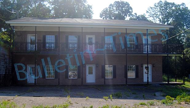 Bill Garrett Jr. was denied a Certificate of Compliance for a proposed liquor store at 111 S. Water Street because the building is currently divided into three areas. There must be at least 1,000 square feet of retail according to the liquor ordinance.