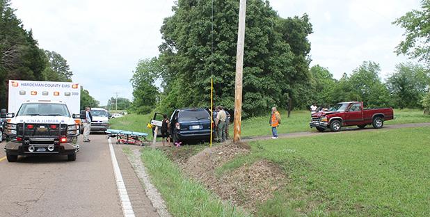 Three injured in two car collision Law enforcement officials said the driver of the red Dodge truck struck the Dodge Caravan as the van was turning into a driveway. The driver and two passengers of the van were transported to the hospital.