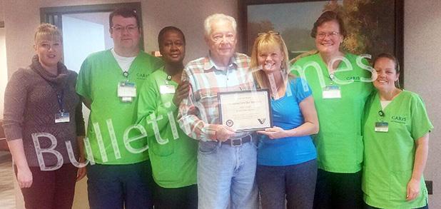 Caris Healthcare honors Bill Stone Bill Stone was honored for his military service by Caris Healthcare through the presentation of a certificate at the company’s Somerville office. Stone is a visiting volunteer for the hospice company. He is a veteran of the U.S. Army. Pictured (l-r): Shanley Gumpert, Timothy Petersen, Sharon Currie, Bill Stone, Cathy Filcek, Lisa Kee, and Gloria Mast.