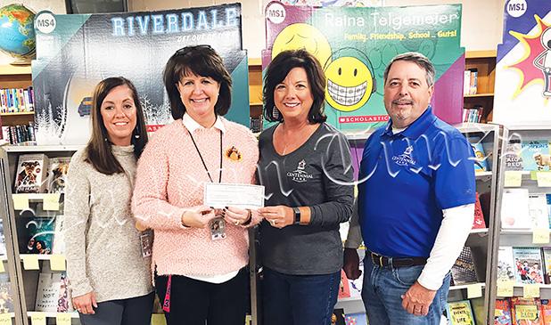 Centennial Bank Gives to BMS Centennial Bank made a donation to the Bolivar Middle School Library. Pictured are (left to right): Bolivar Middle School Assistant Principal Kristy Sims and Bolivar Middle School Library/Media Specialist Deana Sain along with Debbie Moore and Kenny Adkins of Centennial Bank.