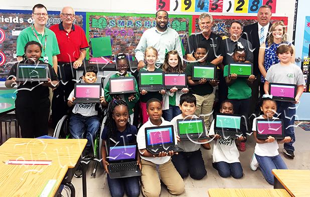 City of Bolivar Donates Tech to Bolivar Elementary Pictured L-R Principal James Rutherford, Buddy Nelms, Mayor Julian McTizic, Bobby Henderson, Kenny Adkins, Warner Ross and 3rd Grade Teacher Stacy Moore and Bolivar Elementary 3rd Grade students.