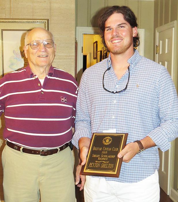 Shelton recipient of Shelby Scholarship President James Burchfield (left) presented the scholarship to Peyton (right). The scholarship is named for charter member William L. Shelby.