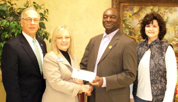 Pictured (l-r):  First South Community Bank President Larry Crawford, Vice President/Branch Manager Lora Moore, Vice President of Hardeman Co Imagination Library Monroe Woods, Representative Cathy Mayfield