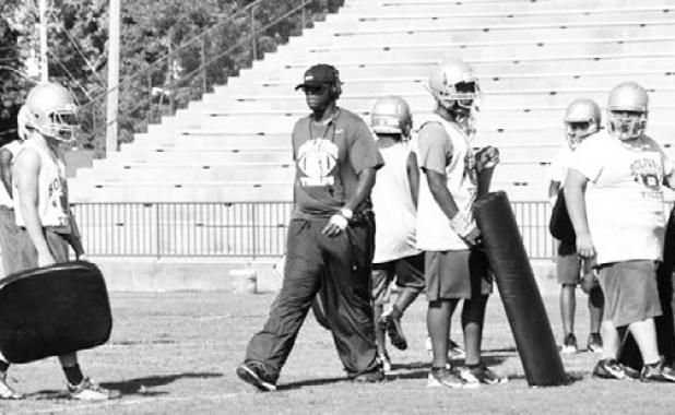 Jennifer Smeltser Coach Woodrow Lowe, Jr. coaches his players in a traditional manner, which is hard with conservative play.