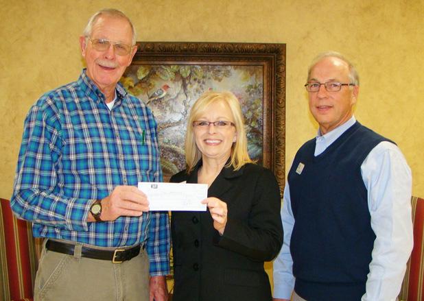 Pictured (l-r): Ken Lain, Administrator of Loaves & Fishes; Lora Moore, VP/Branch Manager of FSB; and Larry Crawford, Community Bank President of FSB.