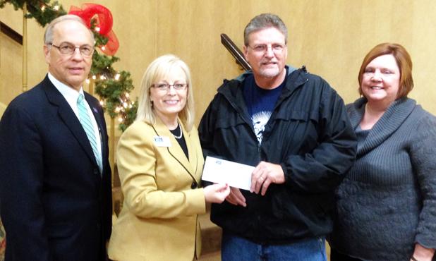 First South donates to Hope House Pictured (l-r): Larry Crawford, Community Bank President of FSB; Lora Moore, Vice President/Branch Manager of FSB; Tony Hall, Executive Director of Hope House; and Andrea Young, Board Member of Hope House