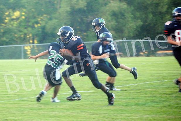Charles Tralor runs the ball for Middleton Middleton Middle loses heartbreaker to Bethel Springs