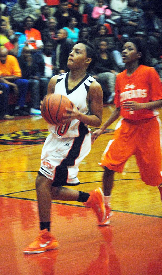 Sequoya Warren goes for a layup.