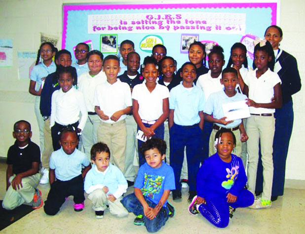 GJES wins 'Be Nice' campaign Pictured front row (l-r): Montreal Traylor, Kenya Polk, Patrick Scrogham, Jordan Warren and Jasmine Mitchell. middle row (l-r): Kaitlyn Sims, Terrion Henderson, Trinity Lee, Perri Rogers and Darrell Walker. Back row (l-r): Cory Warren, Cheyenne Burnett, Bryquell Bennen, Morgan Talley, Kiona Cheairs and Cornesha Hunt. On the fourth row (l-r): Aniya Scruggs, Joshua Davis, Randarian Richardson, Juavante Pirtle, Shanterion Hoyle, Sha’Kayia Jones and GJES Principal Linda Buggs.