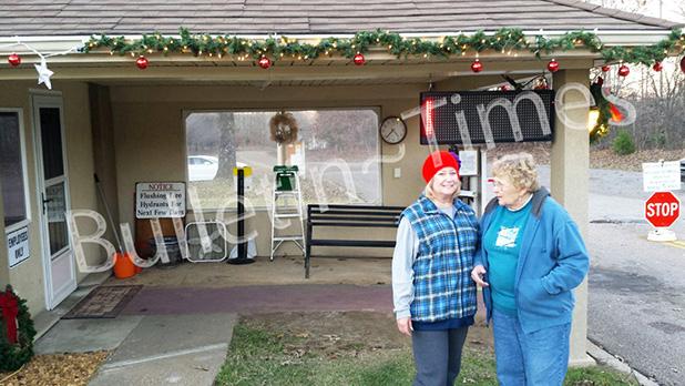 GVL Ladies Club gears up for Christmas Wanda Culver, left, and Louise Watkins, members of the Grand Valley Lakes Ladies Club are shown outside the community’s guard shack. These volunteers decorated the building as part of the club’s Christmas season activities.