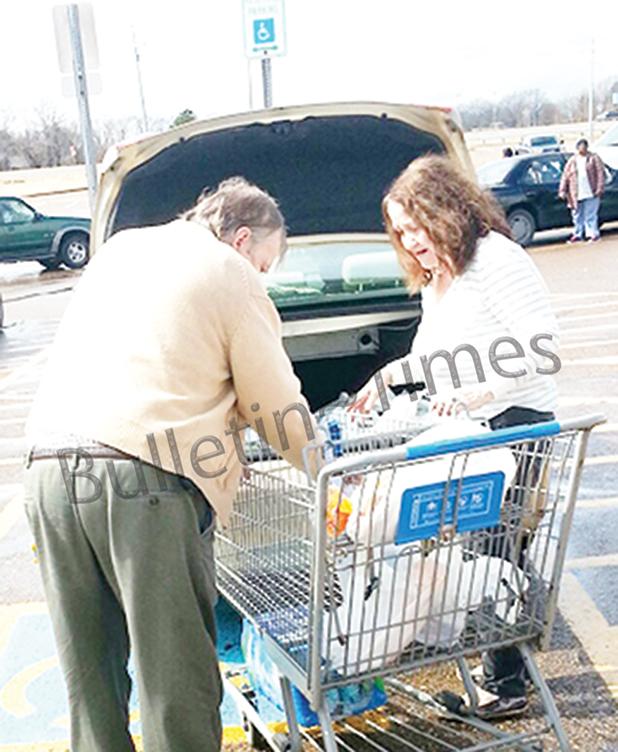 “My husband, Steven, is a disabled veteran. It really makes me mad when people who aren’t disabled use handicap parking spaces,” said Nancy Billingsley. “I just wish people would be more polite.”  The couple is shown here placing their purchases in the trunk of their car.    