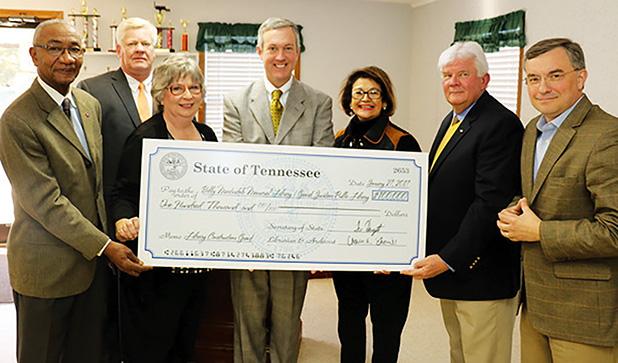 Hargett Brings a Big Check Photo left to right: Representative Shaw, Hardeman County Mayor Jimmy Sain, Grand Junction Library Director Wanza Taylor, Secretary of State Hargett, Senator Gresham, Grand Junction Mayor Curtis Lane, and Representative Gant.