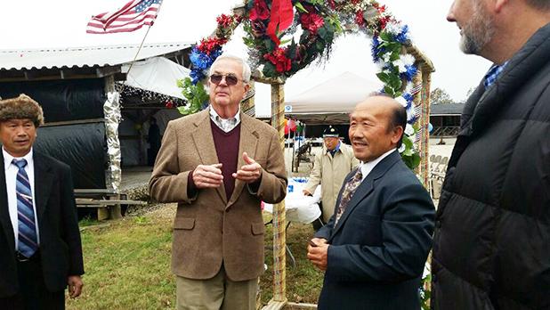 Local Hmong community celebrates the New Year Photo courtesy of Keng Vang. Bolivar Mayor, Barrett Stevens and Hmong Elder, See Sun Vu, each offered blessings to those passing through the “Gate to the Pathway of the Future” at the Hmong New Year celebration Saturday, November 7.