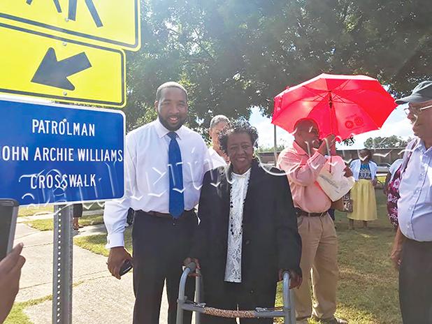 Bolivar Mayor Julian McTizic with Shirley Williams, widow of Bolivar Patrolman John Archie Williams, who kept kids safe in the crosswalk in front of Bolivar Elementary School for 10 years, finishing off a total of 30 years with the Bolivar Police Department.  The city dedicated the crosswalk to his memory on October 8. 