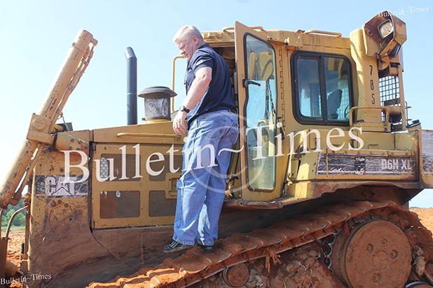 Landfill closed due to continued violations Hardeman County Mayor Jimmy Sain took to the bulldozer Saturday as he pushed dirt over the exposed and uncovered bailed garbage to correct the non-compliance with the laws.