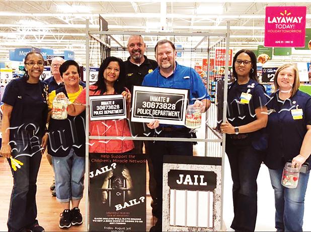 Local Celebrities Raise Bail $$$ Left to right: Pat Robinson,Gary Barber,Teresa McKeen, Maria Howell, Steven Stanley, Greg Vaughan, Anita Price, and Susie Ross.