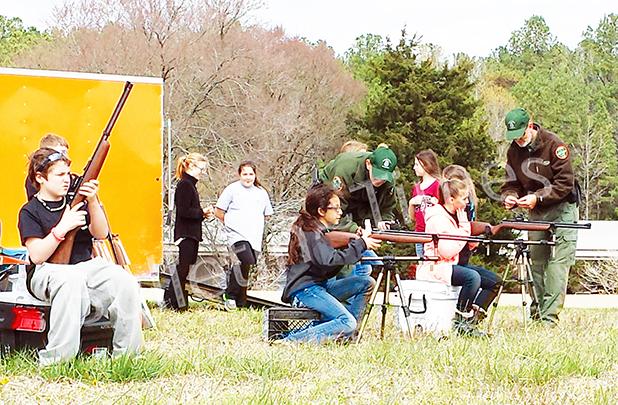 Students use the TWRA shooting simulator. Photo and story by Calley Overton.